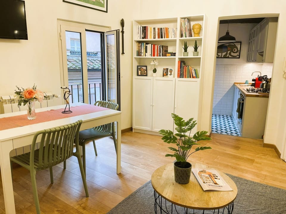 City Apartment | Living area | 21-inch flat-screen TV with cable channels, TV