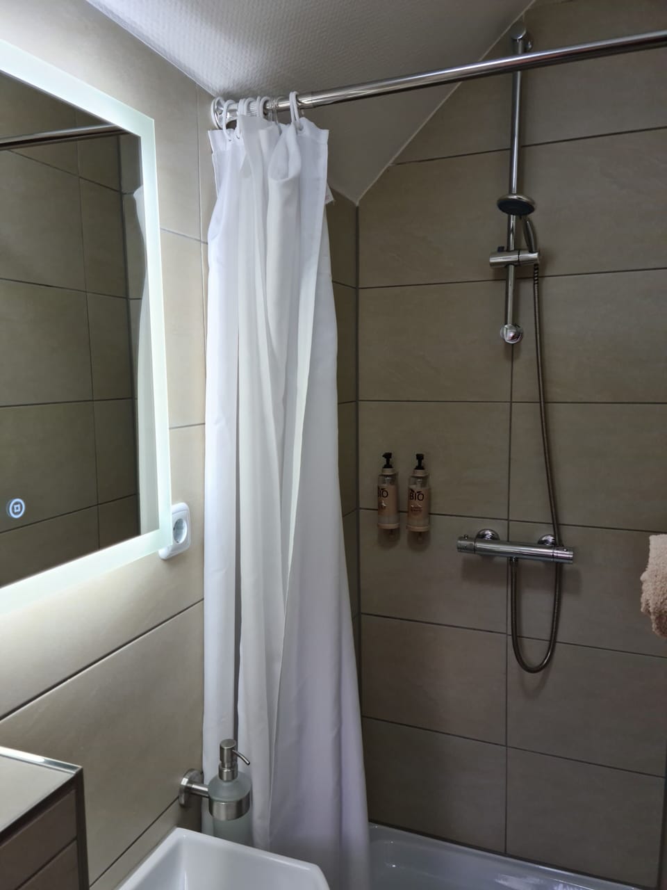 Hair dryer, towels, soap, shampoo