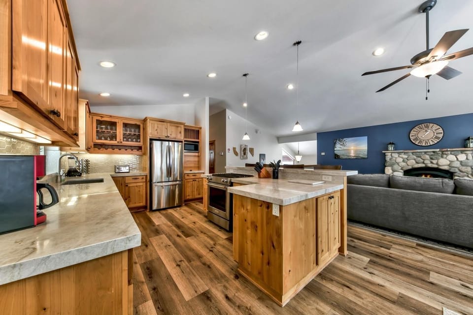Your gourmet kitchen flows seamlessly into the cozy living area, perfect for cooking meals while staying connected with family and friends.