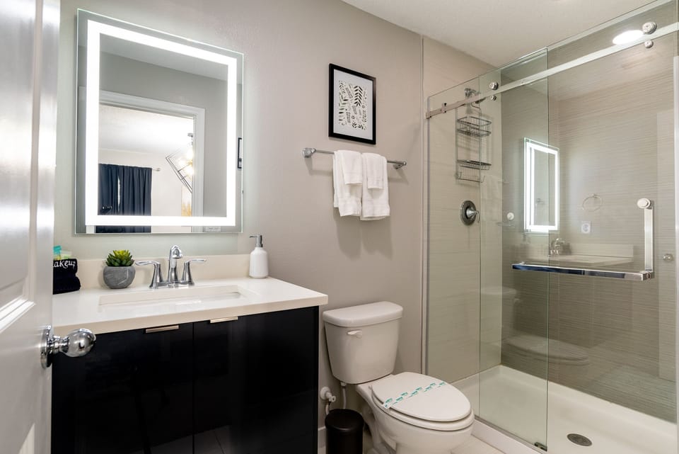Ensuite Bathroom (1st Bedroom) with Single Vanity and Walk-in Shower