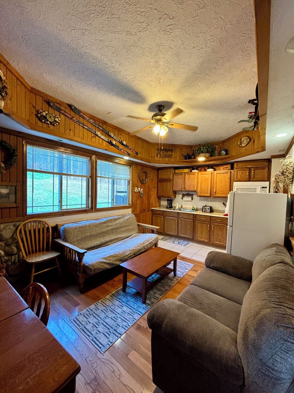 Downstairs living room 1, dining & futon.