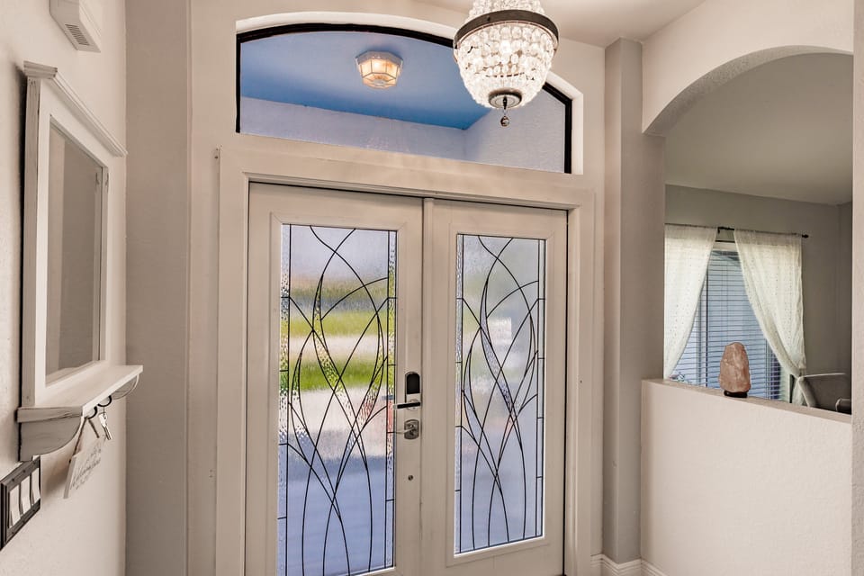 Beautiful glass double door with smart lock. Just shut the door and it locks. 