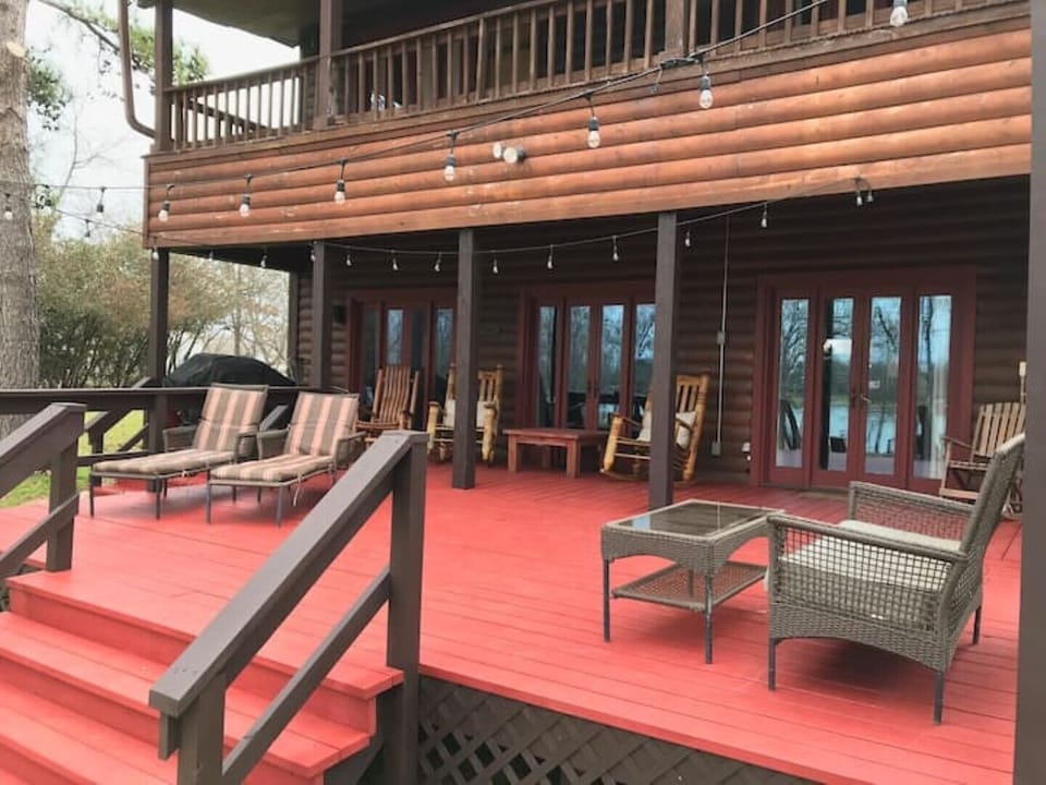 Check out our expansive 12' x 22' deck--with Edison bulb hanging lights.