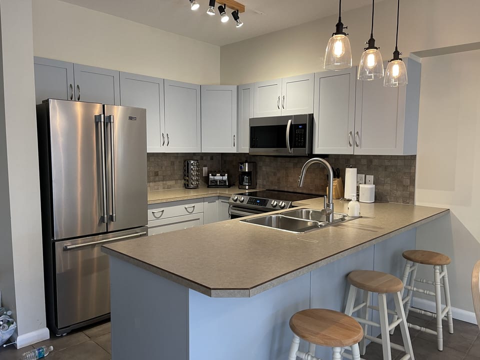 Kitchen with bar seating. 
