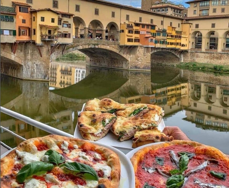 Traditional restaurants with terraces on the banks of Arno river