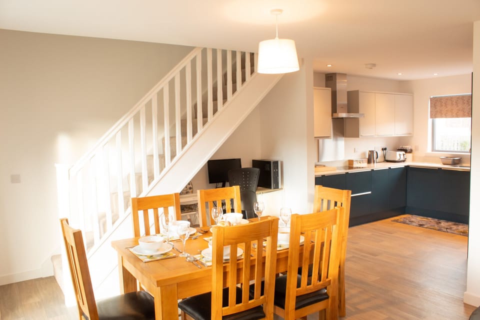 Dining space and modern kitchen