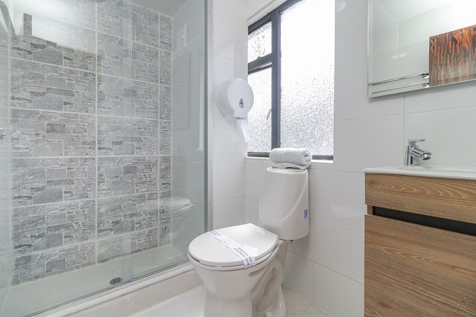 Standard Double Room | Bathroom | Shower, designer toiletries, towels, soap