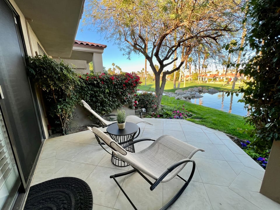 Sip your coffee in our rocking loungers off of the main master suite!