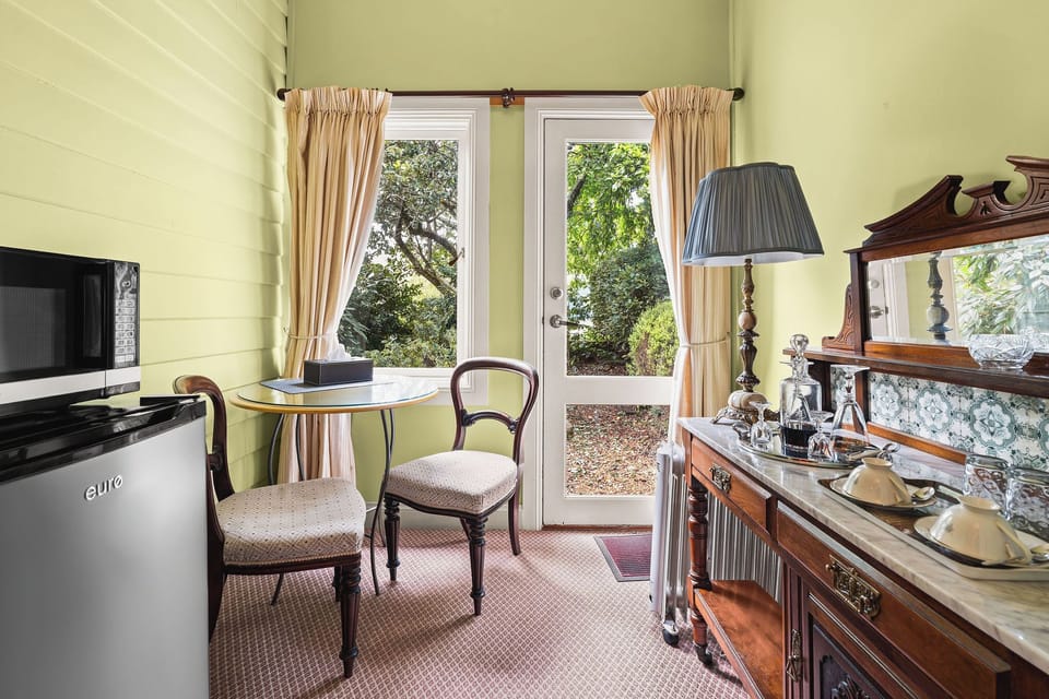 Deluxe Double Room, 1 Queen Bed, Non Smoking, Ground Floor | Living area | Flat-screen TV, DVD player