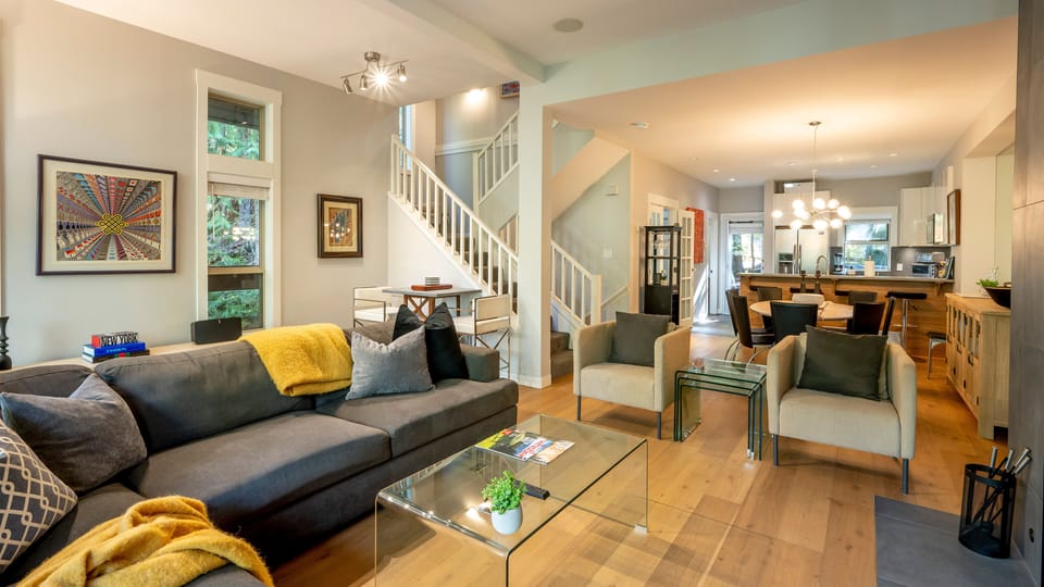 Main Floor - Living Room with Wood Burning Fireplace.