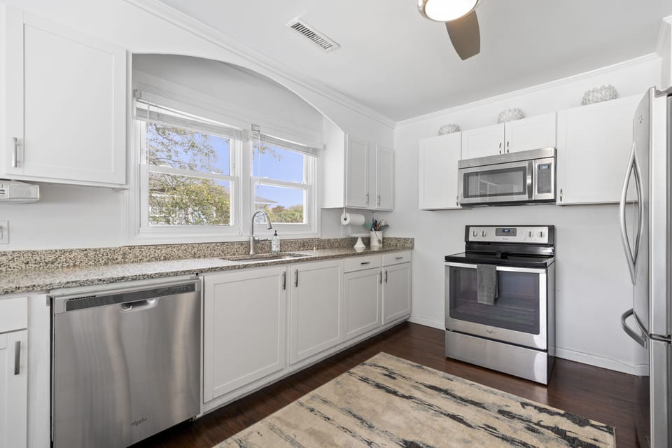 Bright Kitchen with ample counter space and fully equipped kitchen — steps from the beach