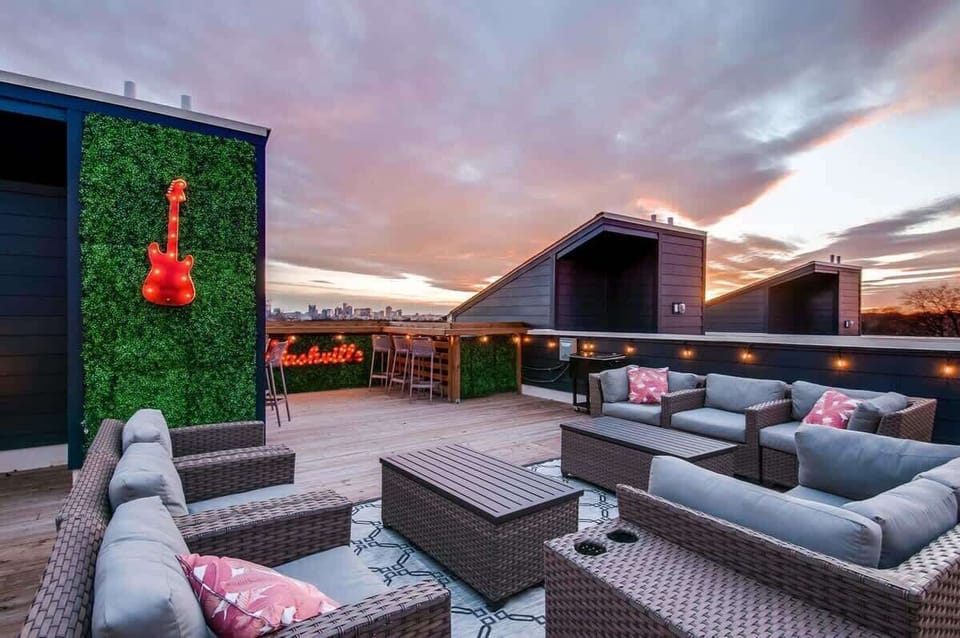 Take in stunning downtown Nashville skyline views from your private rooftop deck, perfect for bachelorette parties or family reunions. With stylish seating and vibrant decor, this luxurious space is ideal for socializing under the stars!
