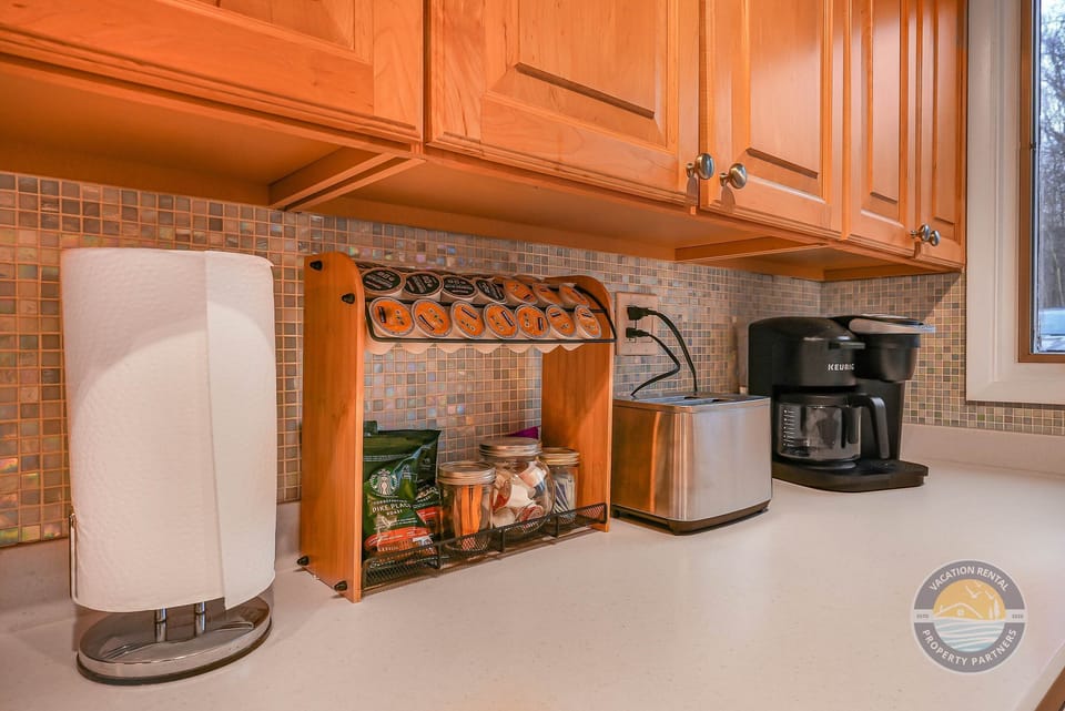 Start your mornings at the dedicated coffee station with a Keurig ready to brew your favorite cup. A simple and thoughtful touch that makes slow mornings on vacation even better.