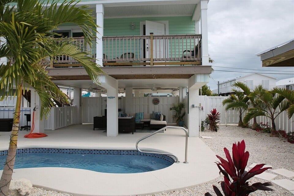 Cool off in the pool, relax in the shade, and enjoy the ultimate outdoor retreat.