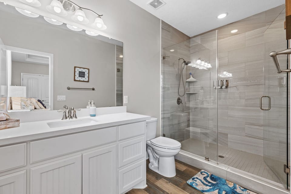 Master bathroom with luxurious walk-in shower.