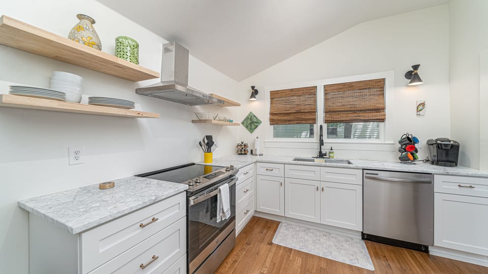 Kitchen.  Plenty of pots, pans, food storage, cooking utensils and supplies.