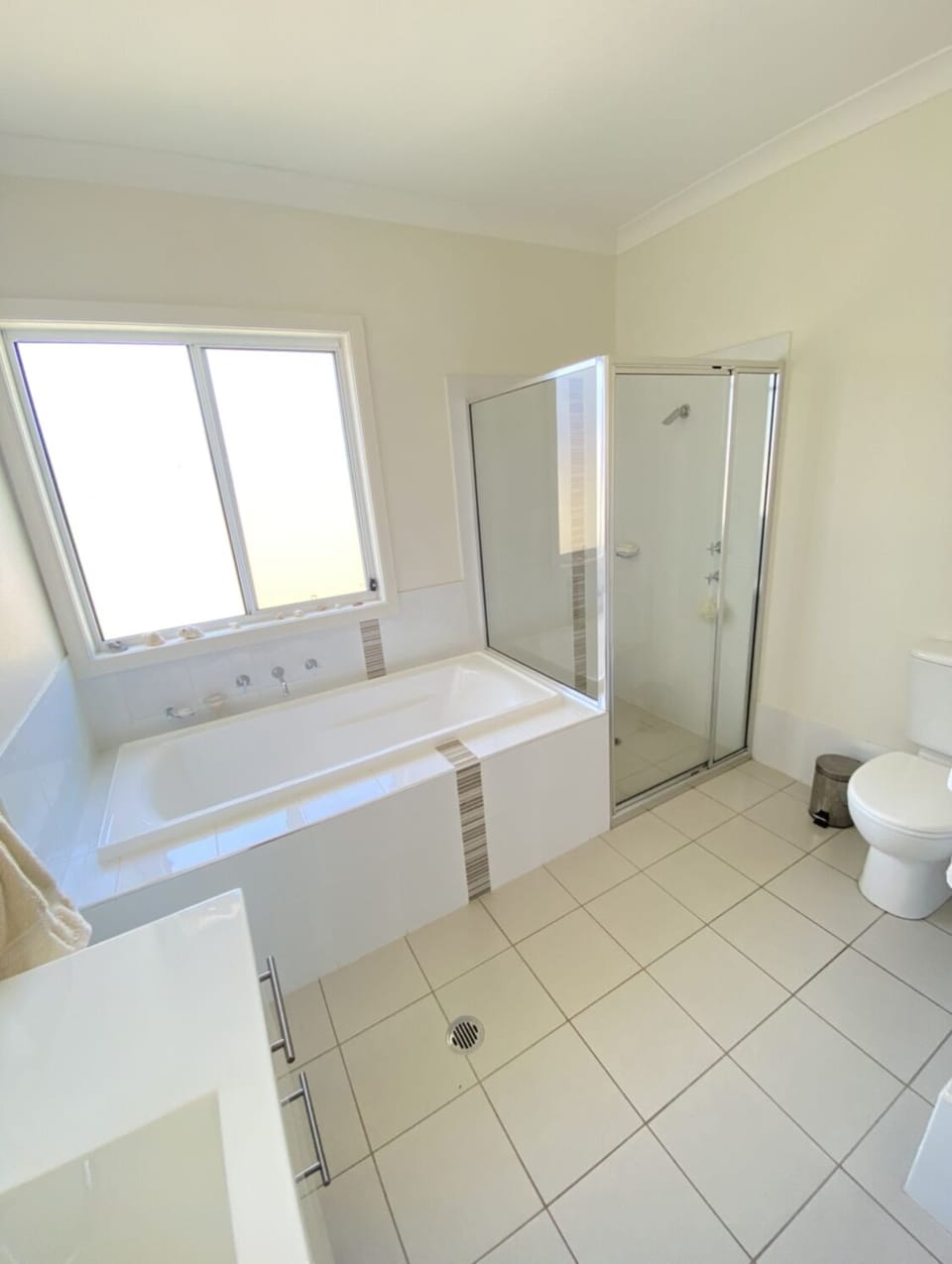 Main Bathroom features full bath, shower & toilet 