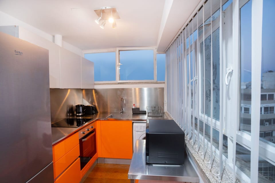 Design Penthouse | Private kitchen | Full-size fridge, microwave, oven, stovetop