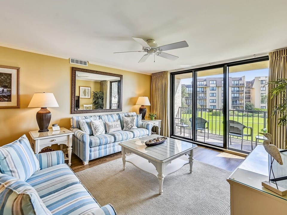 Living Room with Private Balcony at 4201 Island Club
