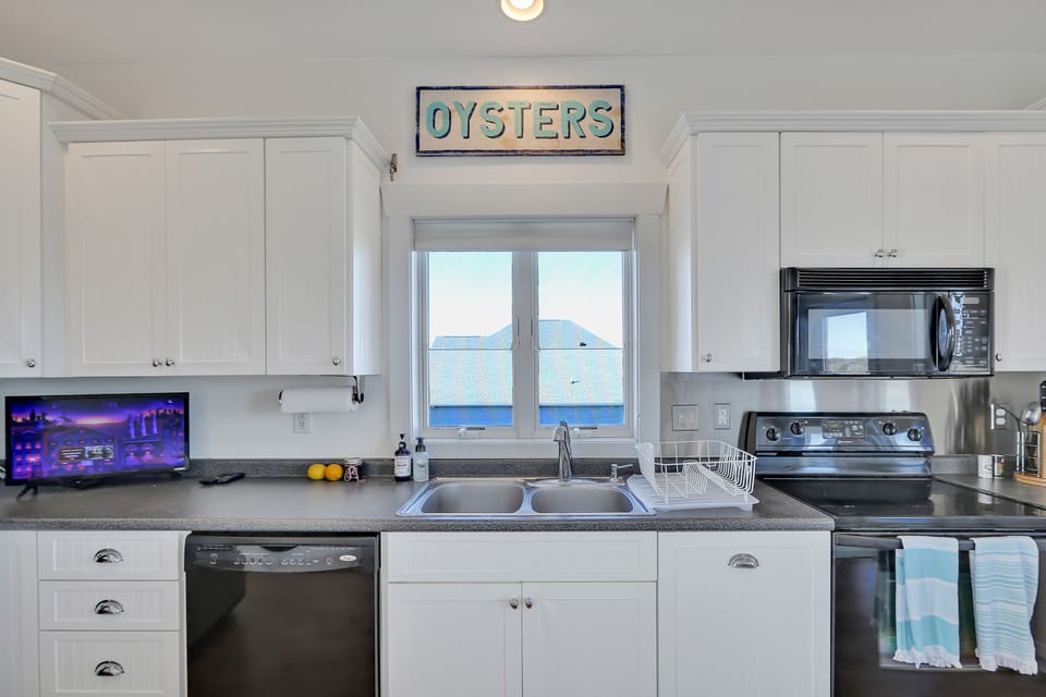 Fully furnished kitchen, including pots, dishes, silverware, etc.
