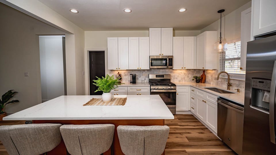 Not fully accessible - undersink cabinets and microwave above stove.