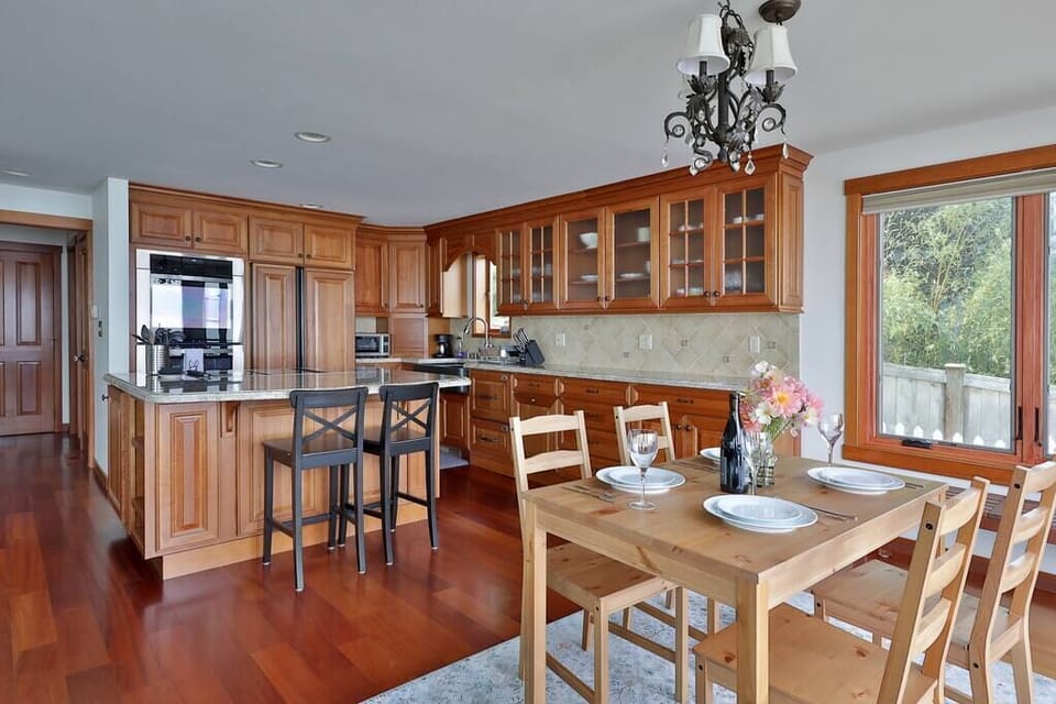 The kitchen has two ovens, built in fridge and dishwasher. Dining table seats 4 comfortably