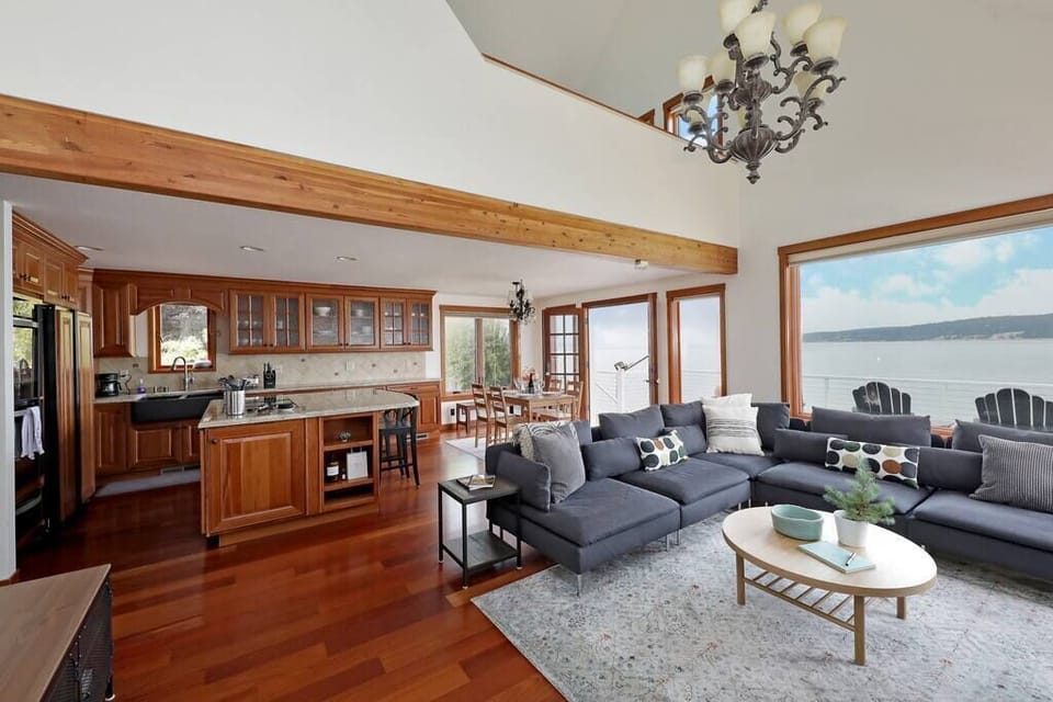 Open concept first floor has high vaulted ceilings