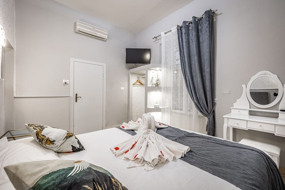 Economy Double Room, 1 Queen Bed | In-room safe, blackout drapes, soundproofing, iron/ironing board