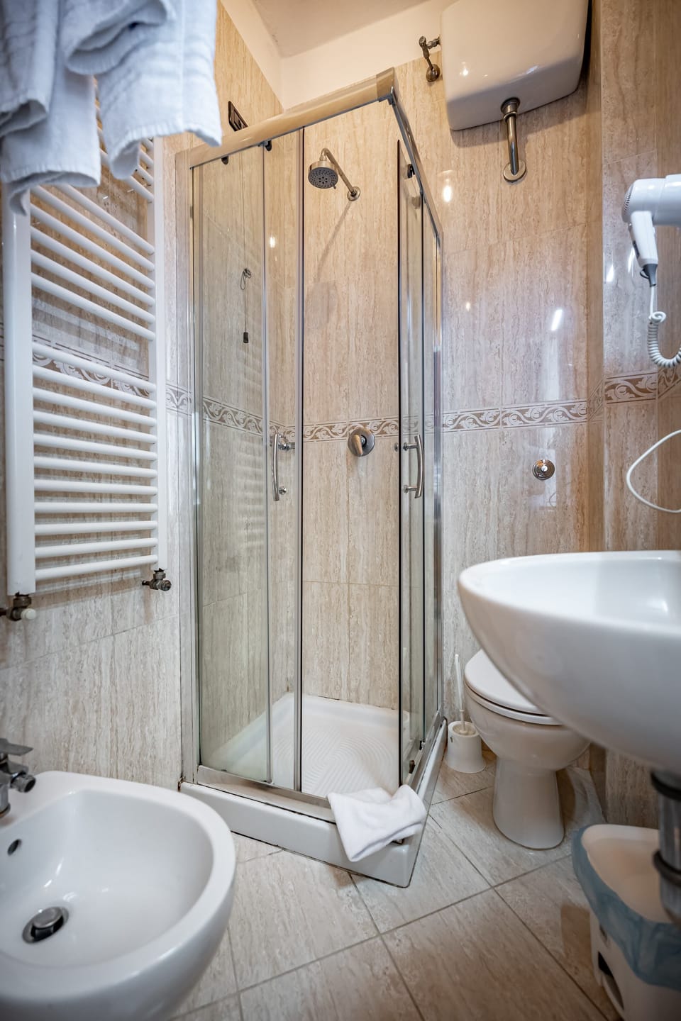Standard Triple Room, 1 Bedroom | Bathroom | Shower, free toiletries, hair dryer, towels