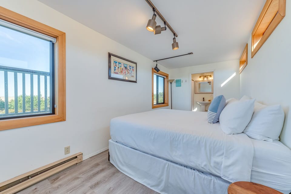 Garage loft bedroom with king bed and ensuite bathroom.