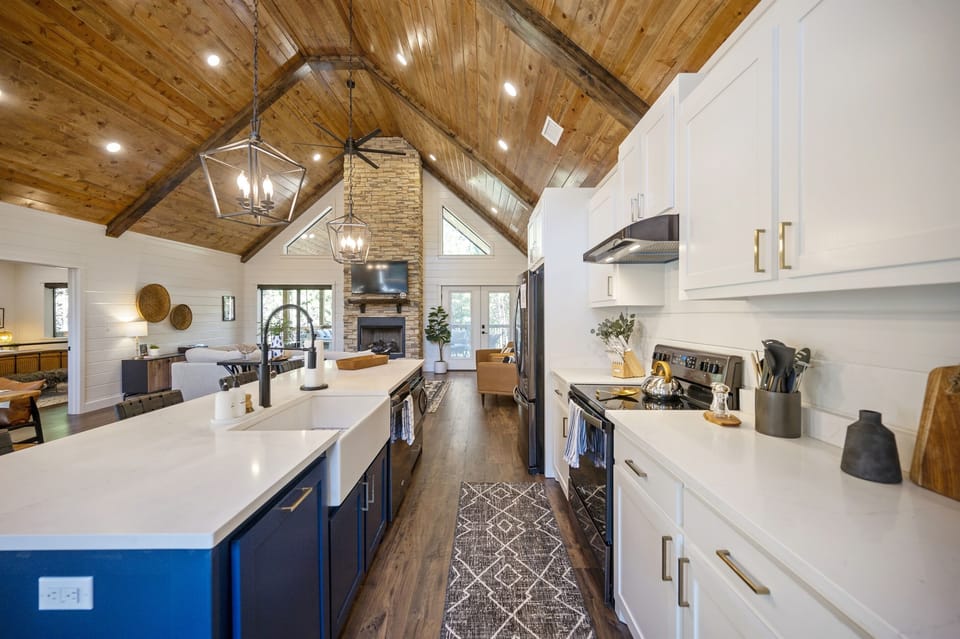 "Prepare delicious meals in our fully-equipped gourmet kitchen with stainless steel appliances."