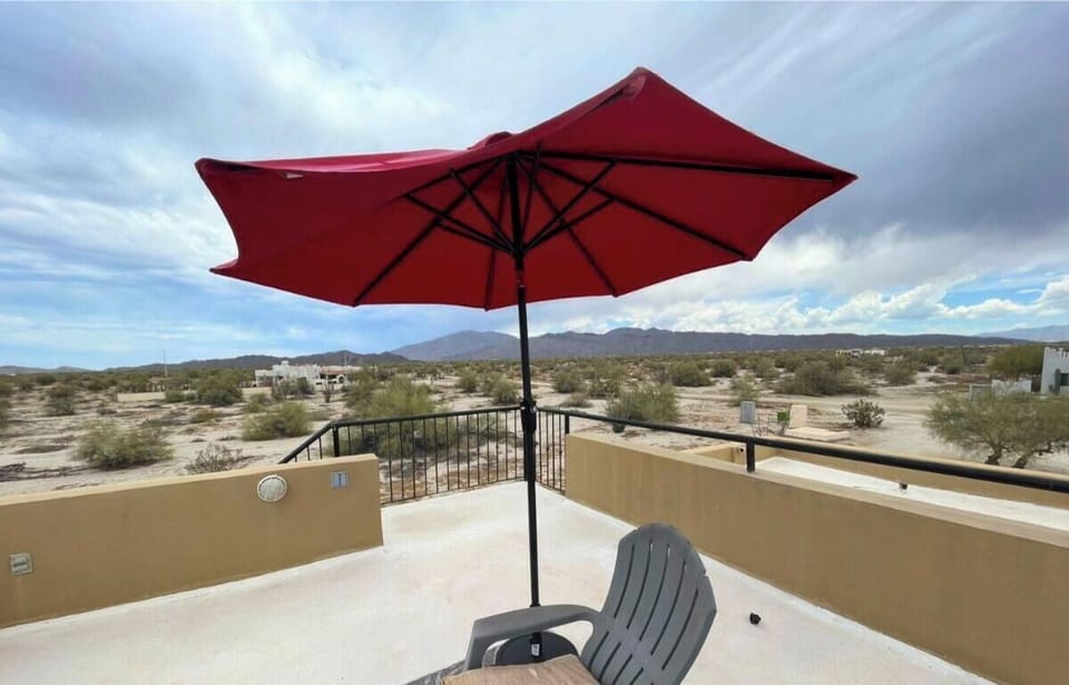 Climb up and relax. This rooftop seating area at Casa Dooley vacation rental inside El Dorado Ranch in San Felipe BC Mexico gives you comfortable chairs and front-row seats to Baja's desert sunset.