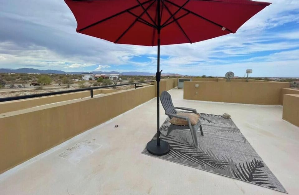 Take in the sunset from above. This rooftop sitting area at Casa Dooley vacation rental inside El Dorado Ranch in San Felipe BC MX offers panoramic desert and mountain views — perfect for evening drinks or stargazing.