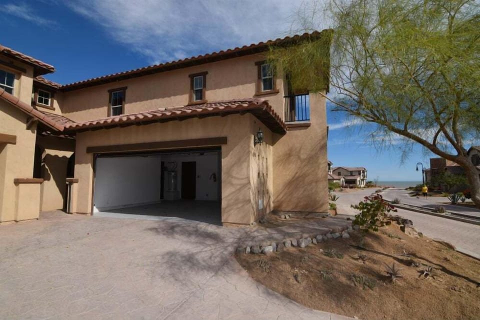 This vacation rental home features an attached two-car garage providing secure, covered parking for your vehicles and beach toys — keeping everything out of the Baja sun
