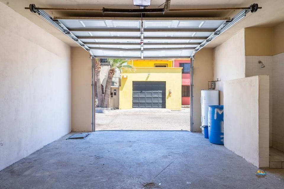 This private garage provides secure covered parking for your vehicle — keeping it out of the sun and sand, just steps from the beach and two blocks from the Malecon.