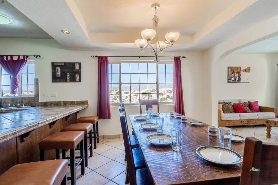 Gather around the spacious dining table at Casa Monterrey in La Hacienda San Felipe BC — perfect for family dinners and game nights.