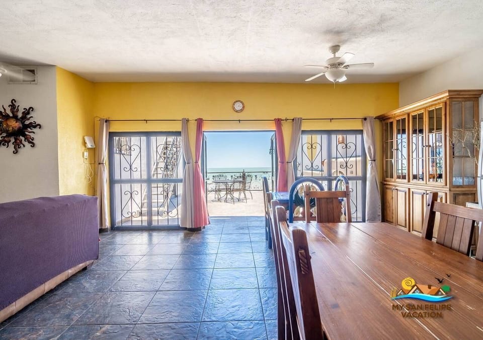 Enjoy meals with a view at the dining table in Casa Las Palmas, located in the Las Palmas community of San Felipe BC Mexico — beachfront dining at its best.