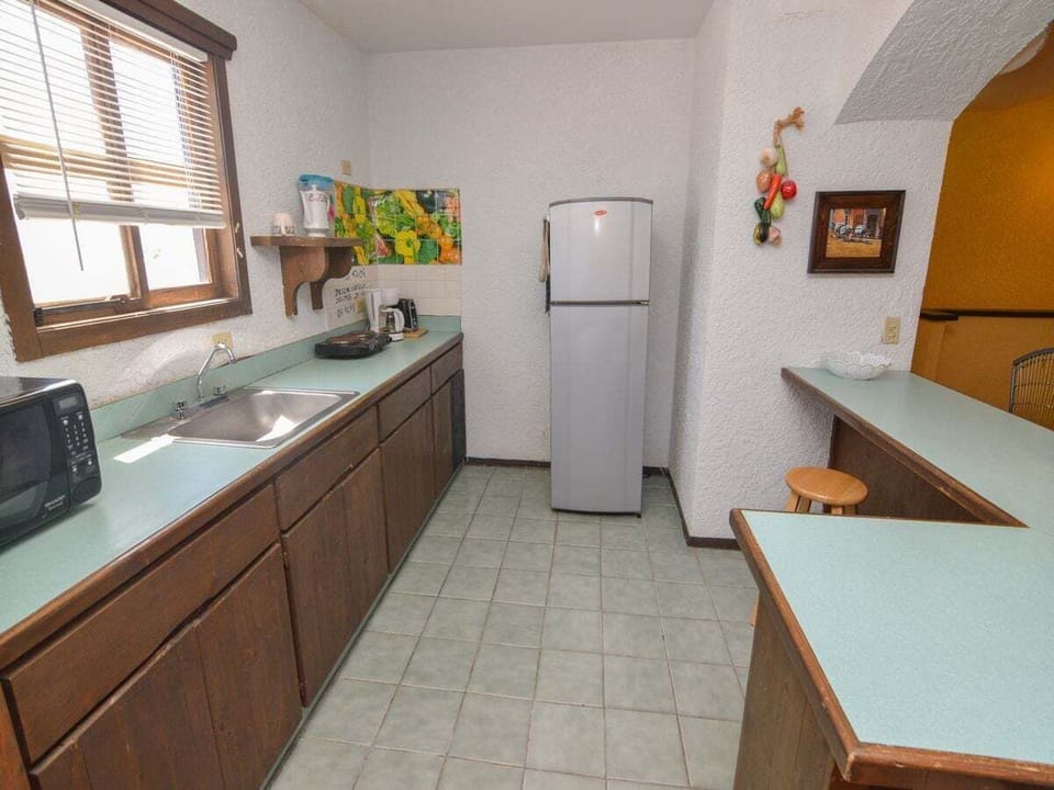 La Hacienda vacation rental condo 10 - kitchen The kitchen includes a dishwasher and microwave