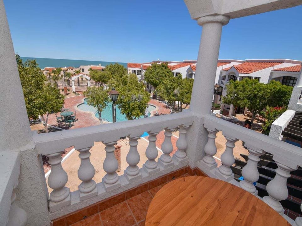 This air‑conditioned vacation rental features a private balcony, one of the standout amenities of this 1‑bedroom condo in La Hacienda.