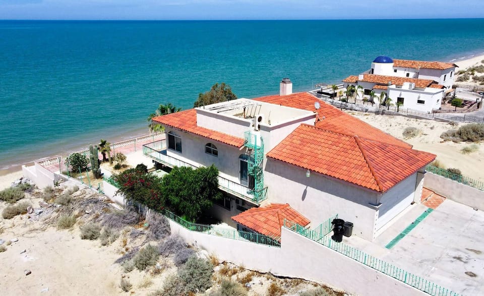 See the full beach house from above — ocean, layout, and beach proximity in one drone shot of this San Felipe BC Mexico rental.