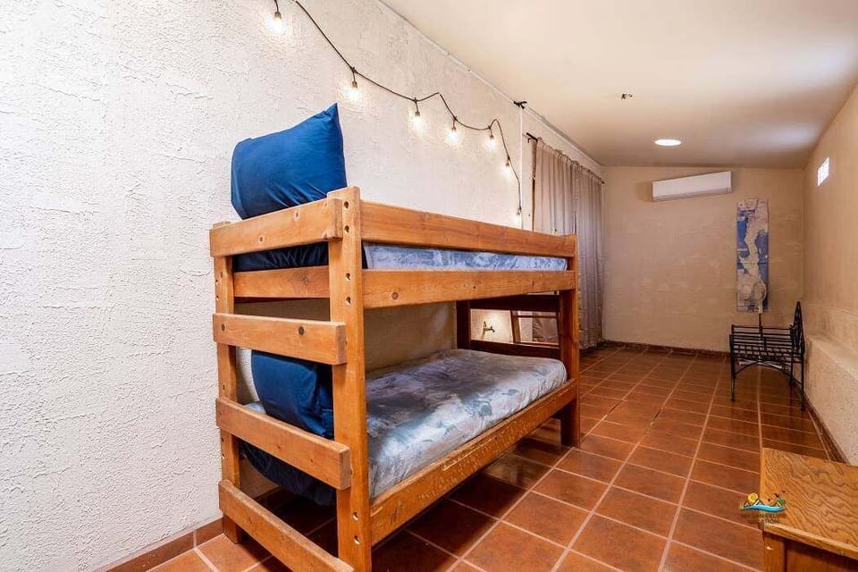 This bonus space features two bunk beds (four twin beds total), new curtains for privacy, and is tucked away from the main living areas — perfect for kids or extra guests .