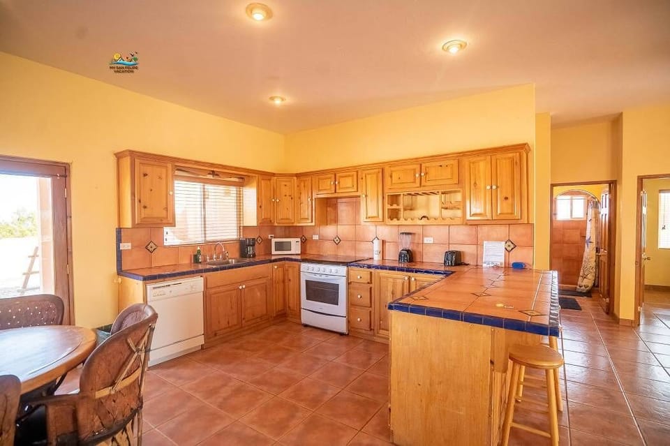 Relax in the spacious living room of Casa Melissa in Playa de Oro San Felipe Baja — comfortable seating for your whole group.