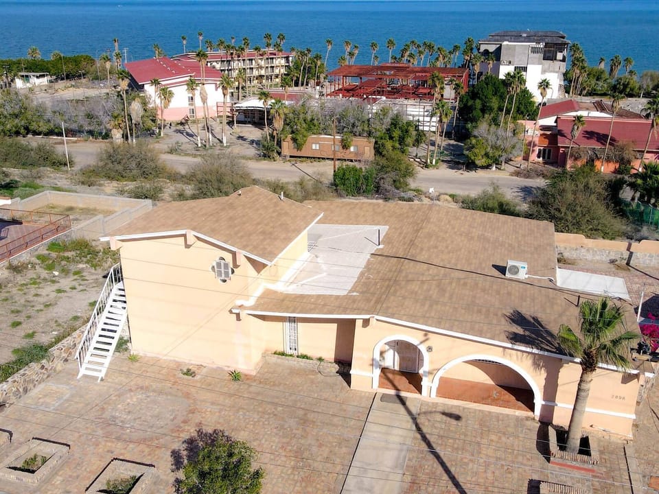 Step outside to the sand with stunning Sea of Cortez views from this luxury beach home .