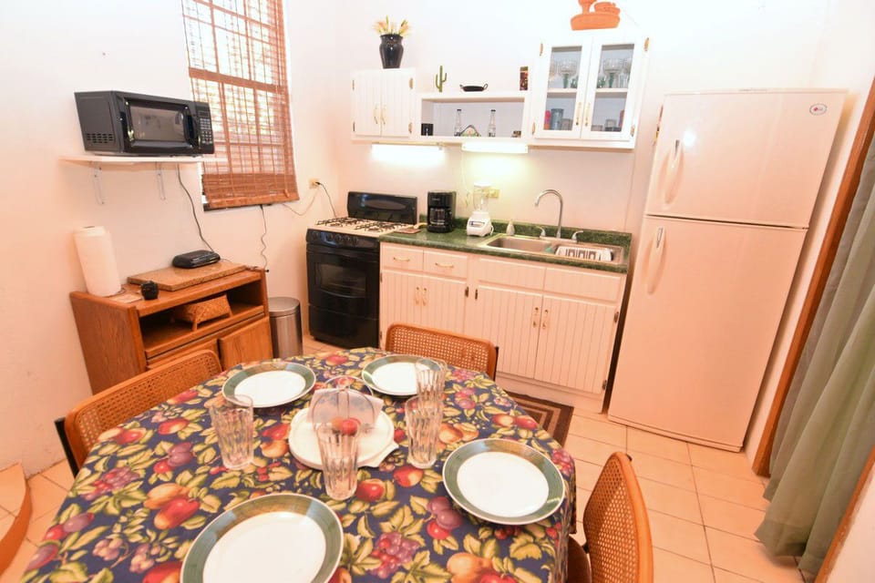 Cozy dining table for two in the kitchen area of Casa Rubio del Mar in San Felipe Baja California — perfect for morning coffee or casual meals.