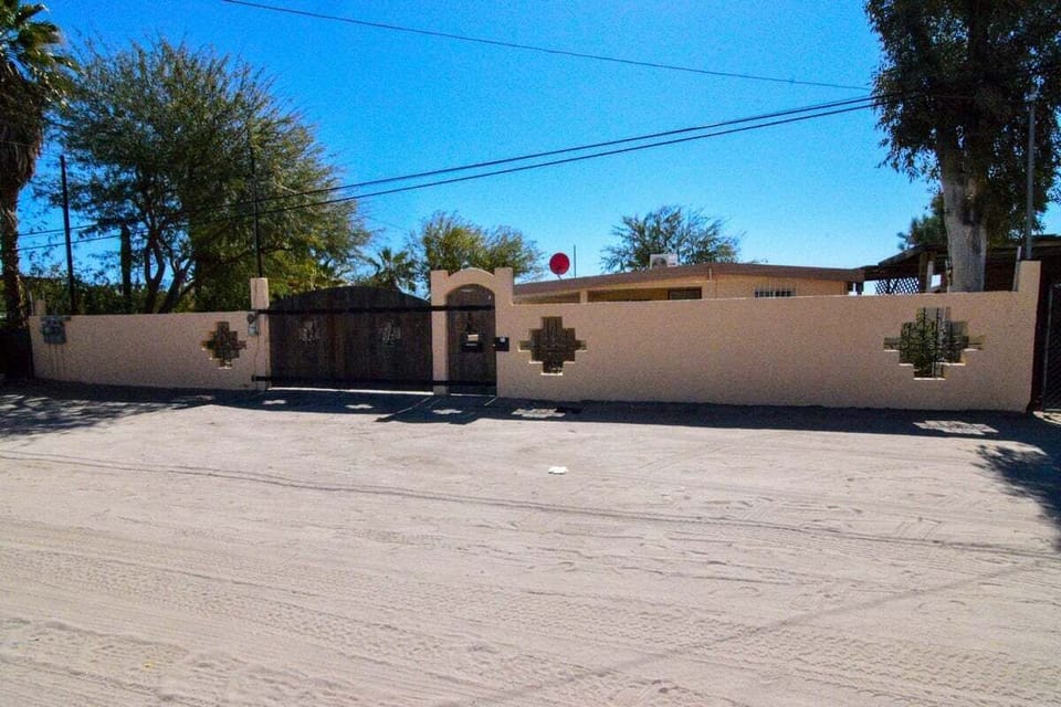 Get a glimpse of the charming street view of Bell Tower Vacation Rental House, San Felipe. A unique & iconic Baja California vacation rental you simply can't miss!
