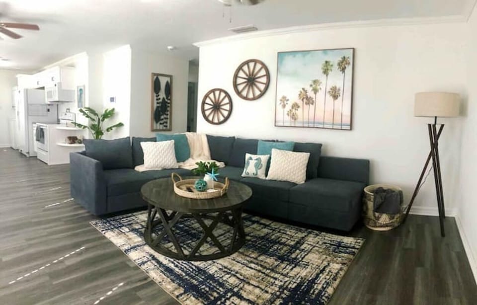Living area, modular couch can be moved into bed 