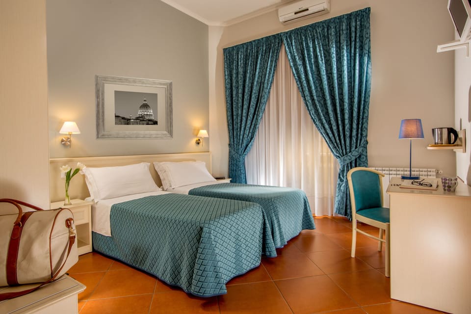Double or Twin Room | Minibar, in-room safe, desk, soundproofing