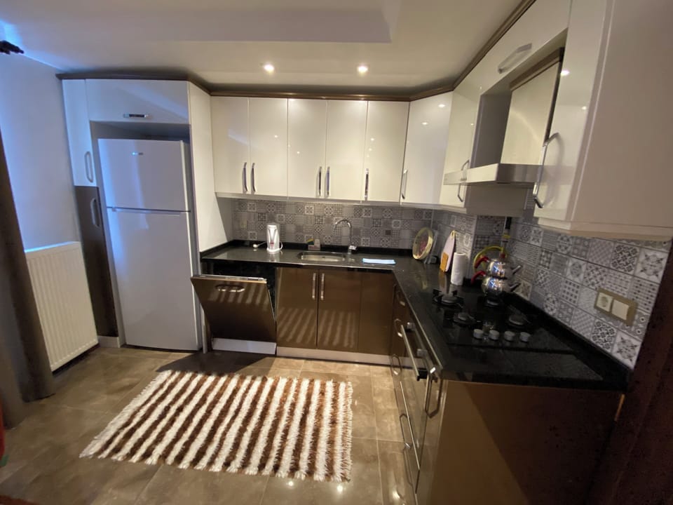 Basic Condo, 2 Bedrooms, Non Smoking | Private kitchen | Full-size fridge, oven, stovetop, dishwasher