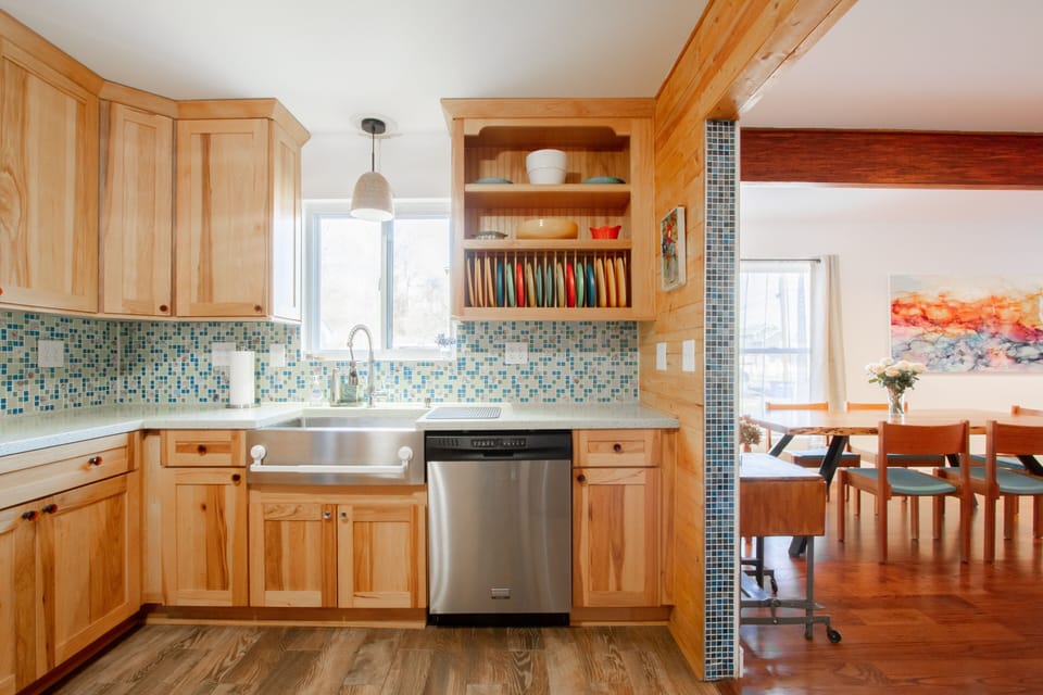 We put bar stools next to kitchen so the chef can chat w/friends in dining room
