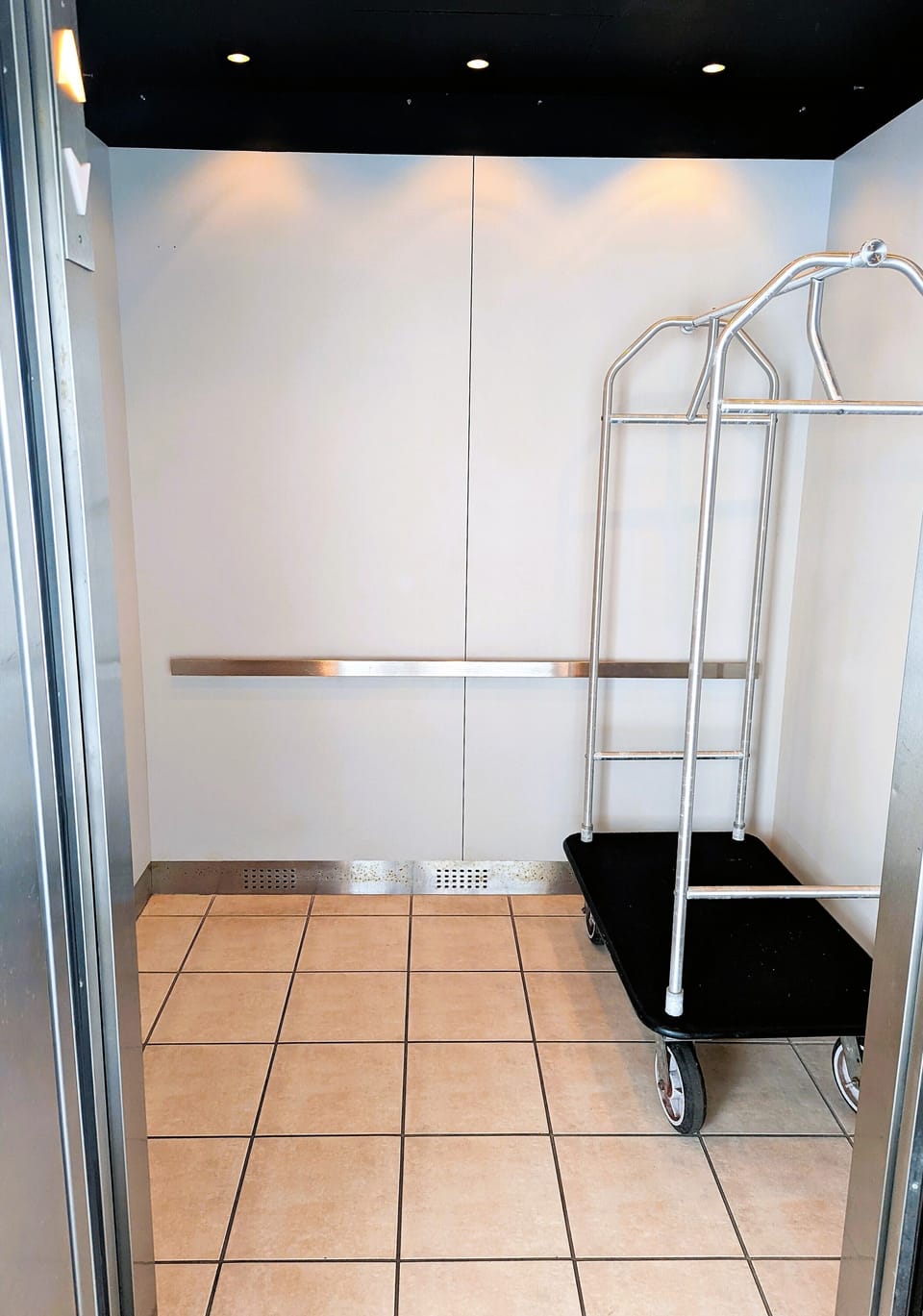 Elevator with luggage cart